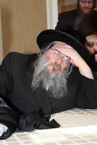 Rabbi Aaron Krausz, a prominent chareidi Rov from Williamsburg, New York, and Rosh Yeshiva of Yeshiva Shaar Hatalmid in Brooklyn.